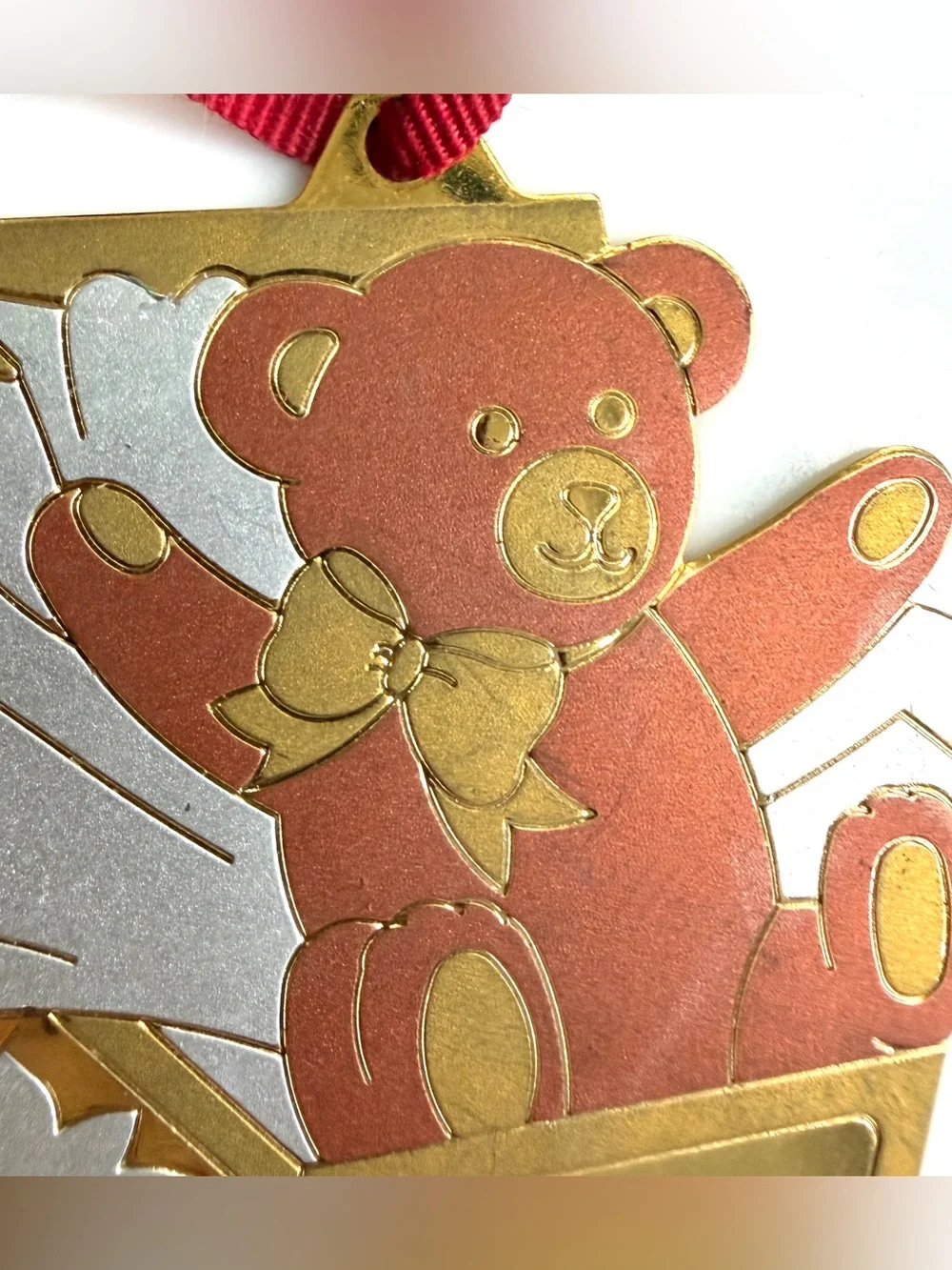 Vintage 1994 Baby First Christmas Bear Present Brass Metal Ornament made in USA